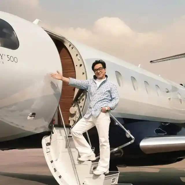 Jackie Chan being cute with his jet