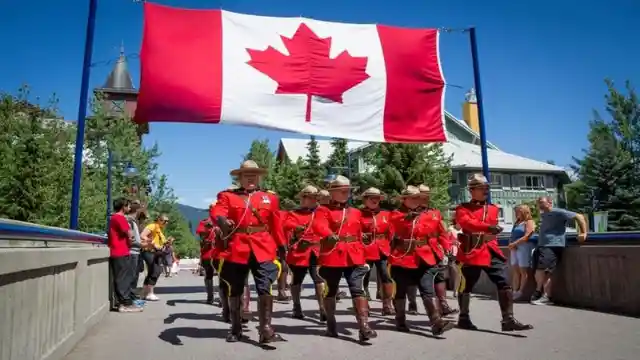 What year was Canada formed as a federal dominion of four provinces?