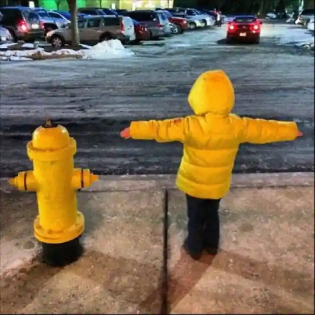 This Little Boy and a Fire Hydrant