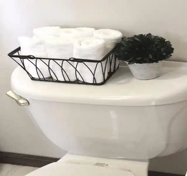 Use A Tray Or Basket To Gather Items On Top Of The Toilet