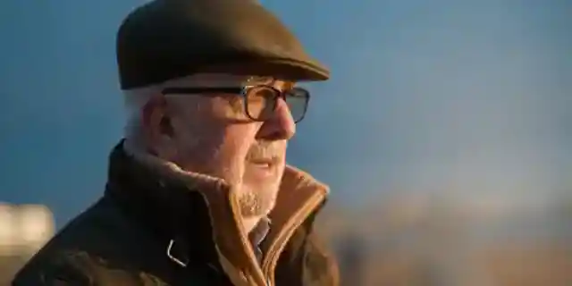 Neighbors Called the Authorities on My 72-Year-Old Dad for Getting Rid of Dogs for Money – When We Opened His Garage, the Officer Was Left in Tears