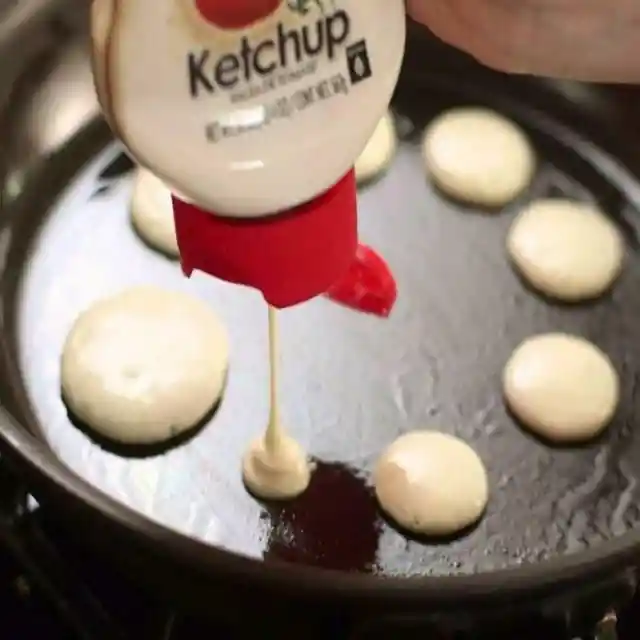 Use empty ketchup bottles as batter dispensers