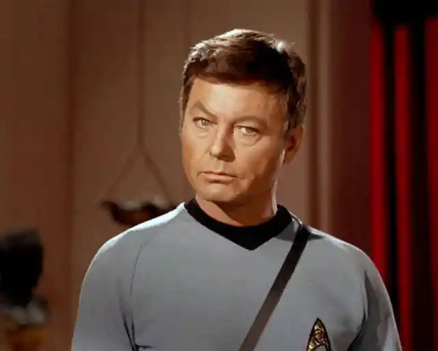 DeForest Kelley as Dr. Leonard ‘Bones’ McCoy