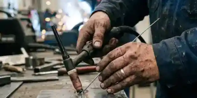 A Man Pointed at My Grease-Stained Hands and Told His Son I Was a Failure – Just Moments Later, His Son's View of Me Changed Completely