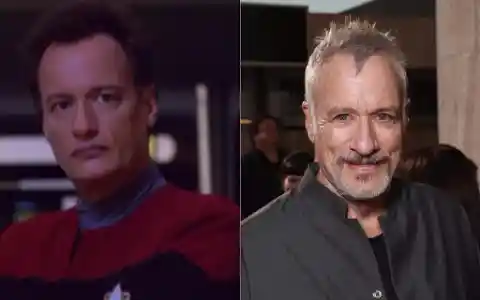 John De Lancie as Q