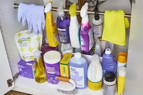 Hang Spray Bottles Inside Cabinet With Tension Rod And S Hooks